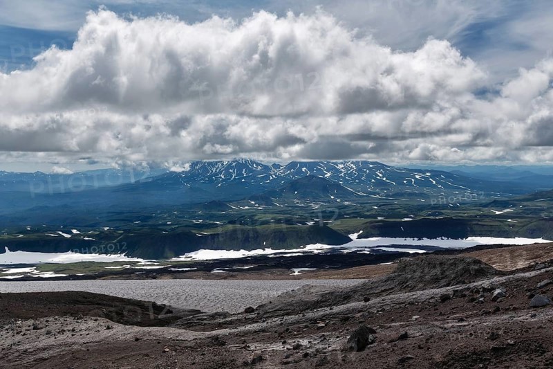 Beautiful mountain (volcanic) cloudy landscape of Kamchatka Peninsula. Asia, Russian Far East