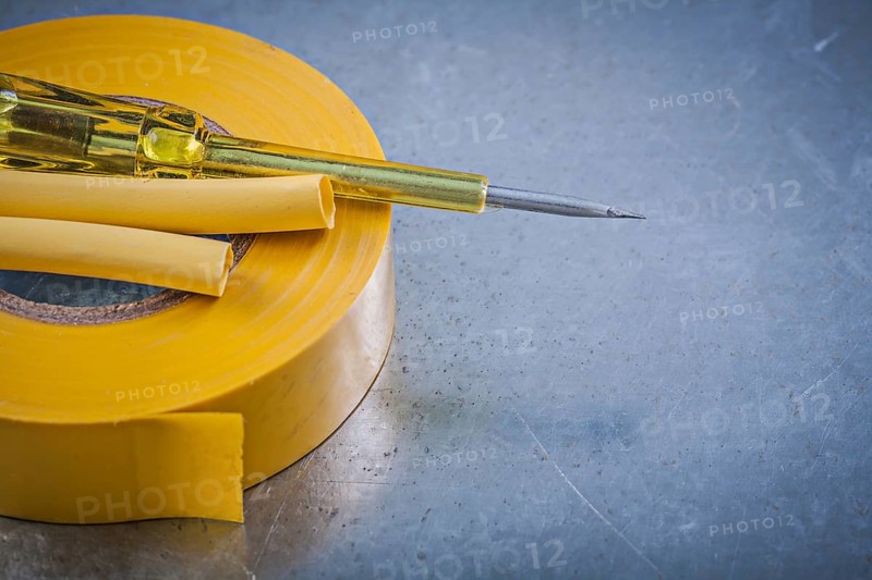 Yellow insulating tape electric cables insulated turnscrew construction concept