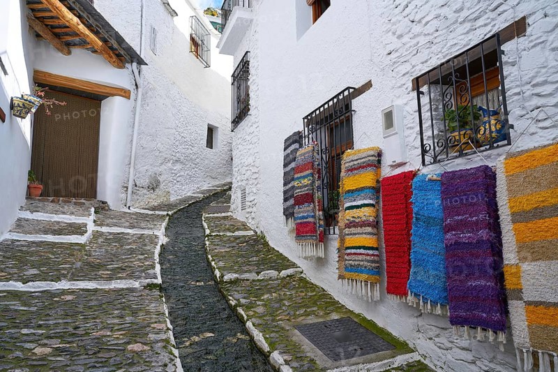 Alpujarras street rugs in Pampaneira of Granada colorful serape