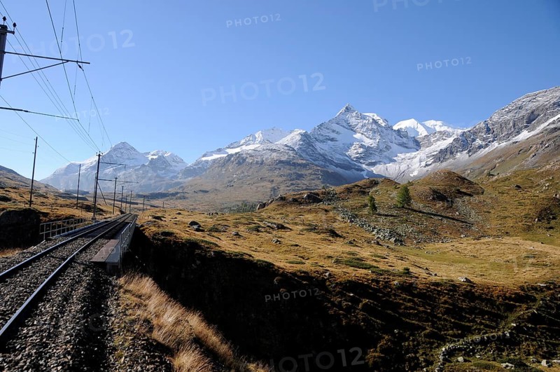 Bernina railway line via the Hospitz to Posciavo. Bernina railway tracks since 100 years connecting Engadin and Posciavo/Tirano