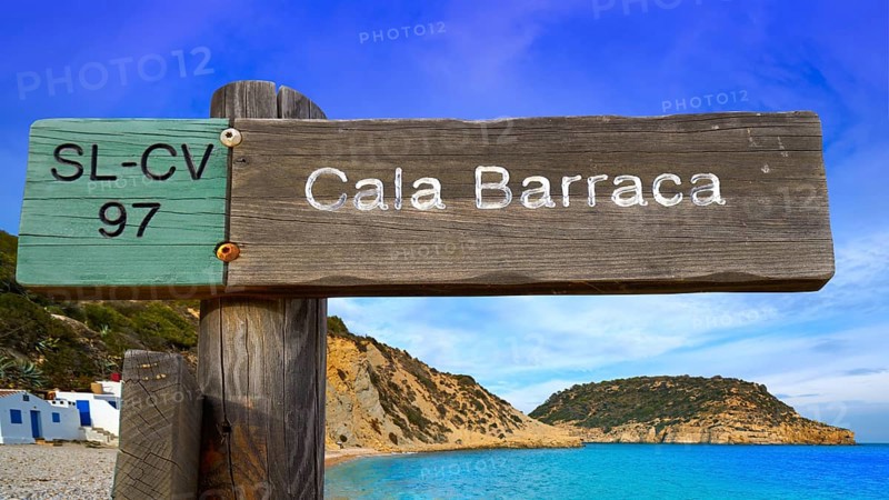 Cala Barraca beach sign in Xabia Javea photomount on background Alicante Spain