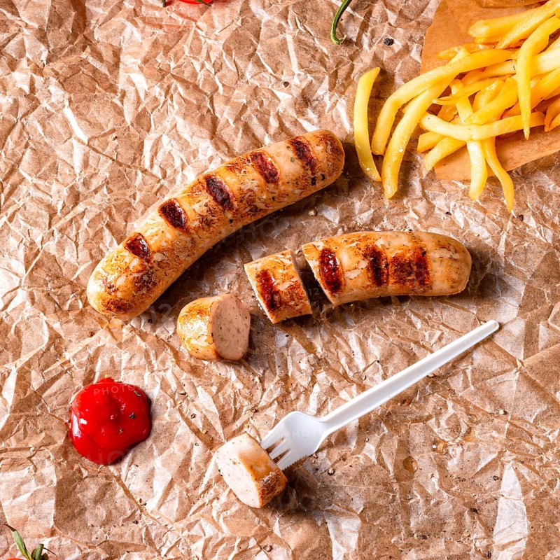 Rustic bratwurst with pommes and hot ketchup