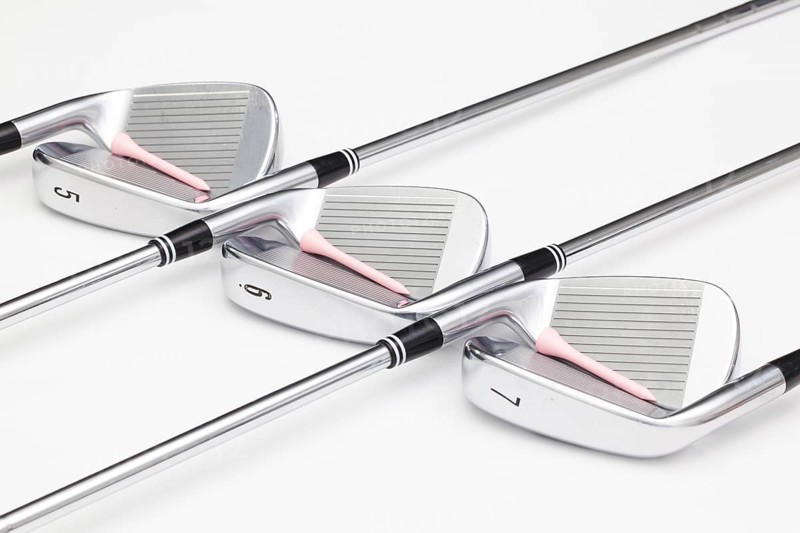 Titanium golf clubs on the white background