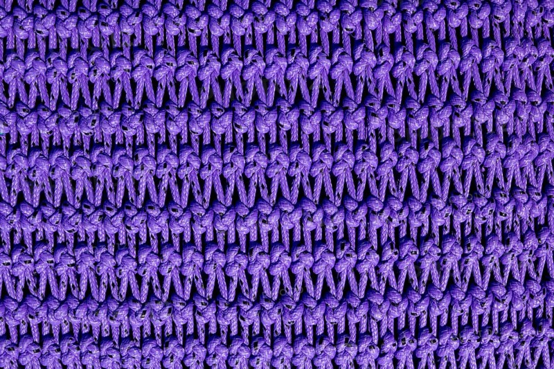 Fishing trawler boat net purple texture with rope knots
