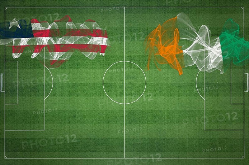 Liberia vs Ivory Coast Soccer Match, national colors, national flags, soccer field, football game, Competition concept, Copy space