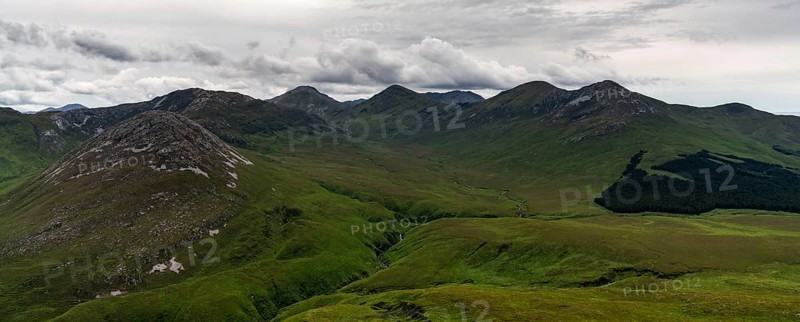 Panorama landscape view of the Twelve Bens mountains in Connemara National Park in County Galway of Ireland