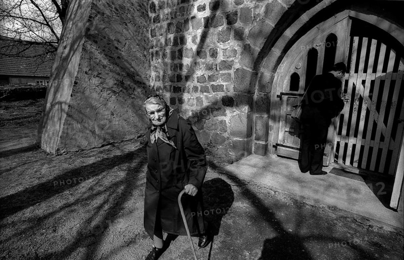 Germany, Steinhöfel, 20 April 1992, Pastor Justus Werdin locks the church, with the only visitor to the church service in Steinhöfel on her way home, Europe
