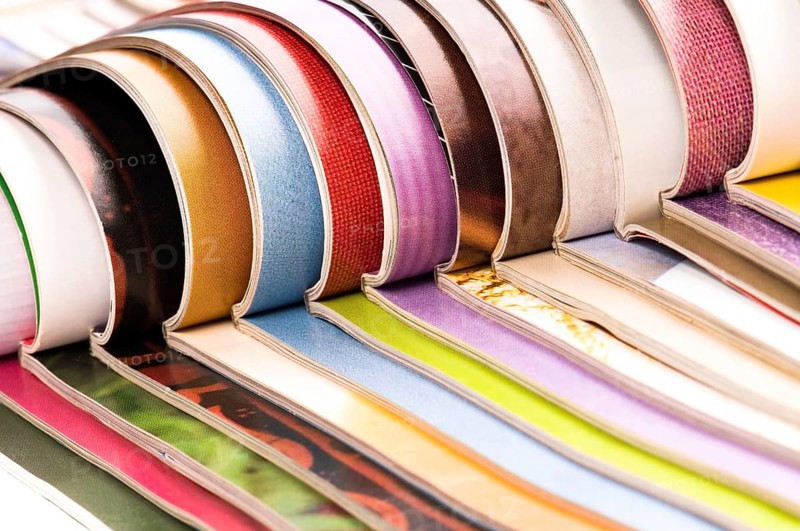 Stack of open magazines