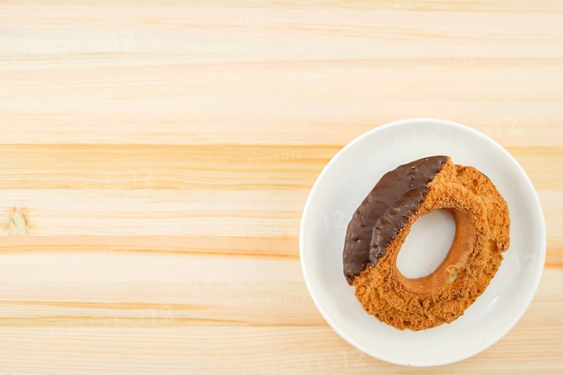 Chocolate donut placed in a dish. Shooting Location: Yokohama-city kanagawa prefecture
