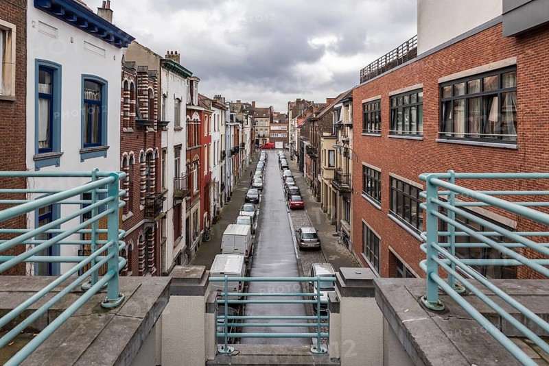 Schaerbeek, Belgium, 03 16 2018: architecture of a dead end residential street with traditional residential houses, Europe