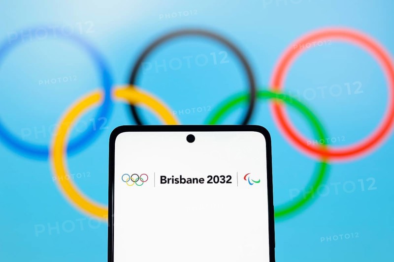 In this photo illustration, the 2032 Summer Olympics Games, Brisbane 2032 logo is displayed on a smartphone screen