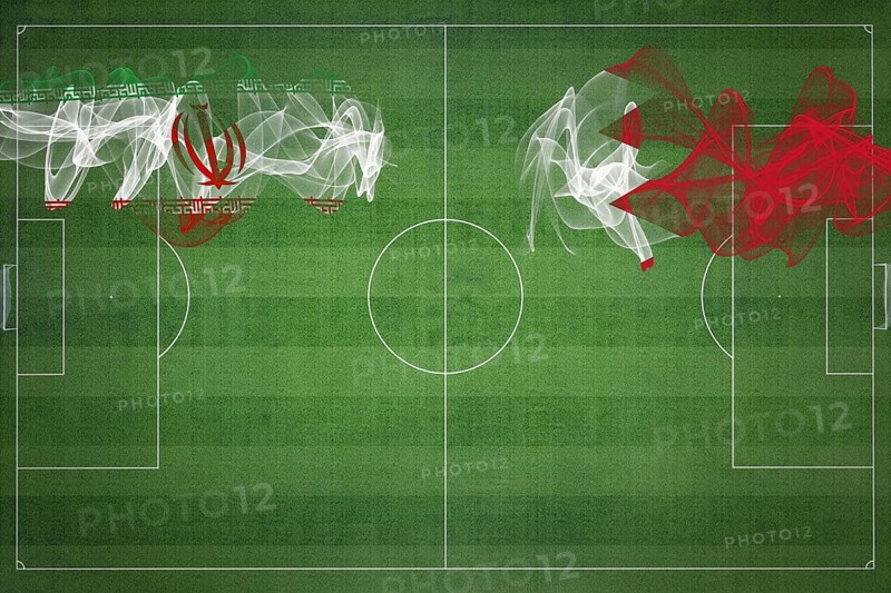 Iran vs Bahrain Soccer Match, national colors, national flags, soccer field, football game, Competition concept, Copy space