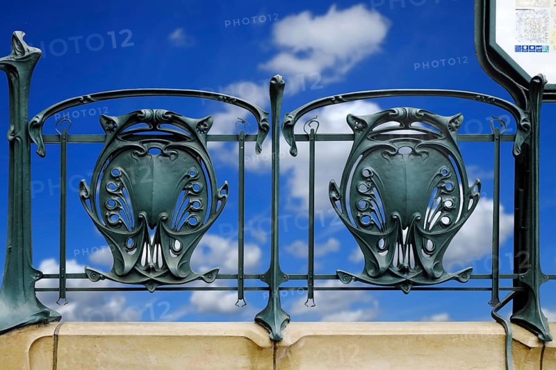 Railing of a Paris metro station with typical floral Art Nouveau elements. Landscape format. Horizontal format