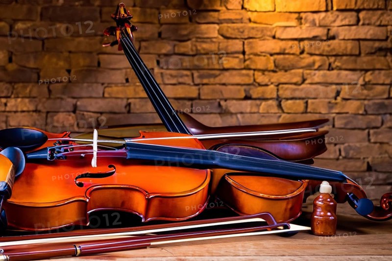 Interior of an old musical workshop with musical instruments and tools