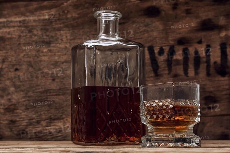 Seasoned brandy into the glasses and decanter vintage style