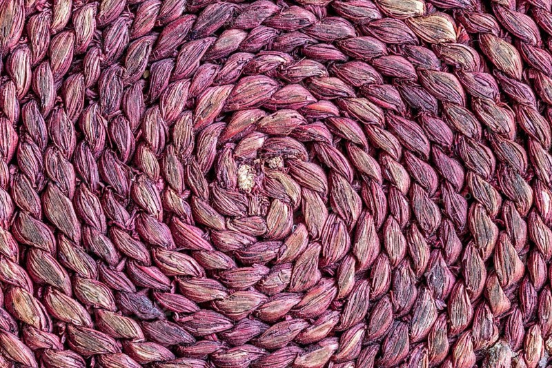 Braided raffia coaster as a background