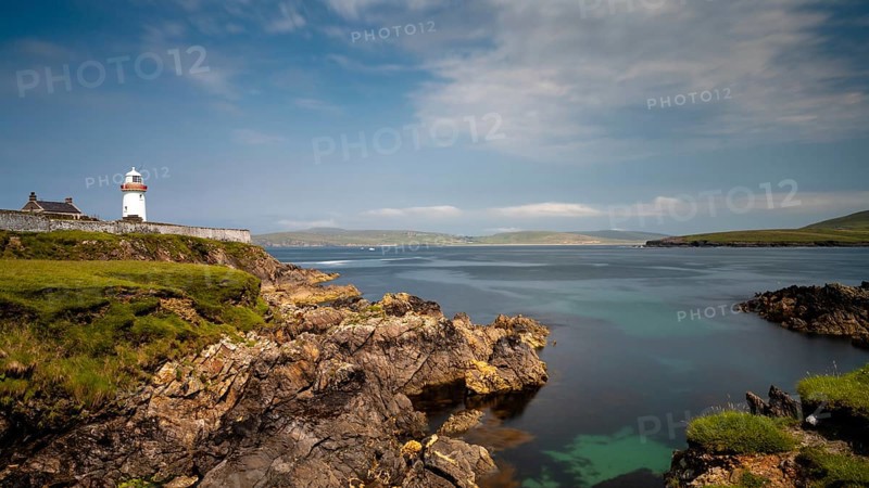 A view of the historic Broadhaven Lighthouse on the Mullet Peninsula in County Mayo in Ireland