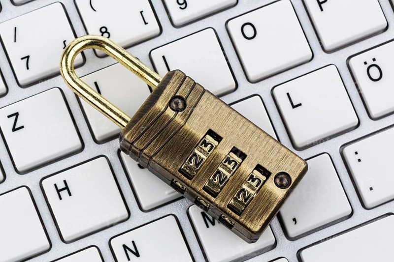 A padlock on a computer keyboard. Symbolic photo for data security and hacking Austria
