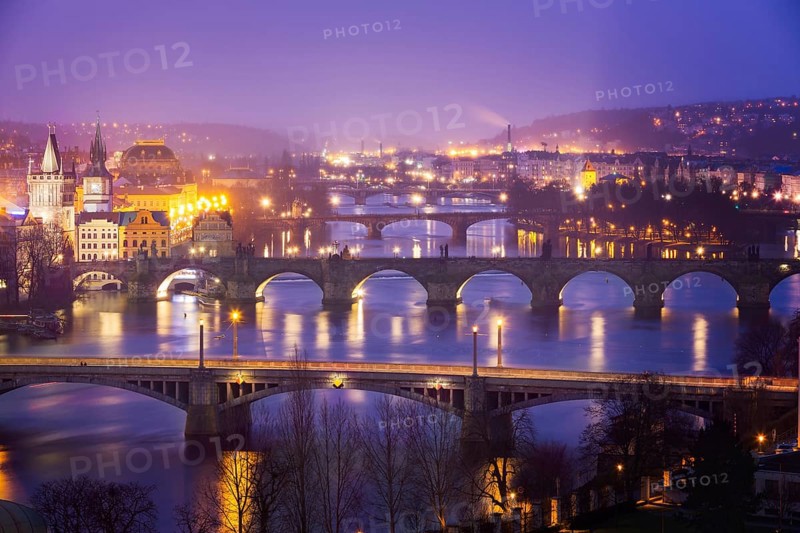 Vltava (Moldau) River at Prague with Charles Bridge at dusk, Czech Republic, Europe