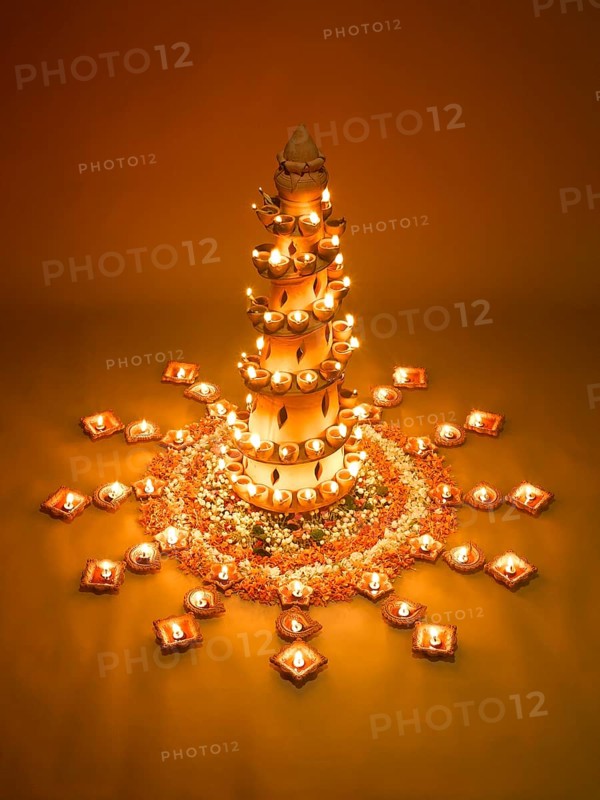 Diyas and flowers arrangement for diwali festival, India, Asia