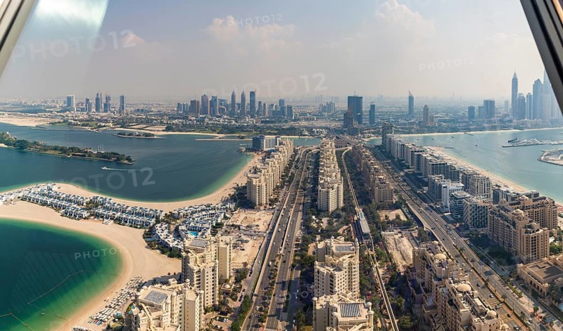 A picture of the Palm Jumeirah Road and the Dubai Internet City District as seen from the View at the Palm