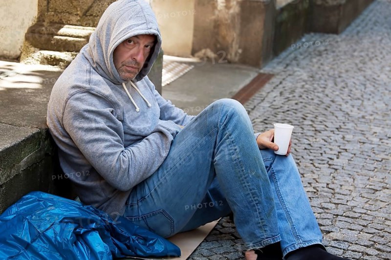 An unemployed beggar is homeless and hungry Austria