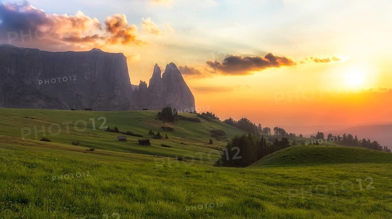Schlern mountain with pasture at sunset, South Tyrol, Italy, Europe