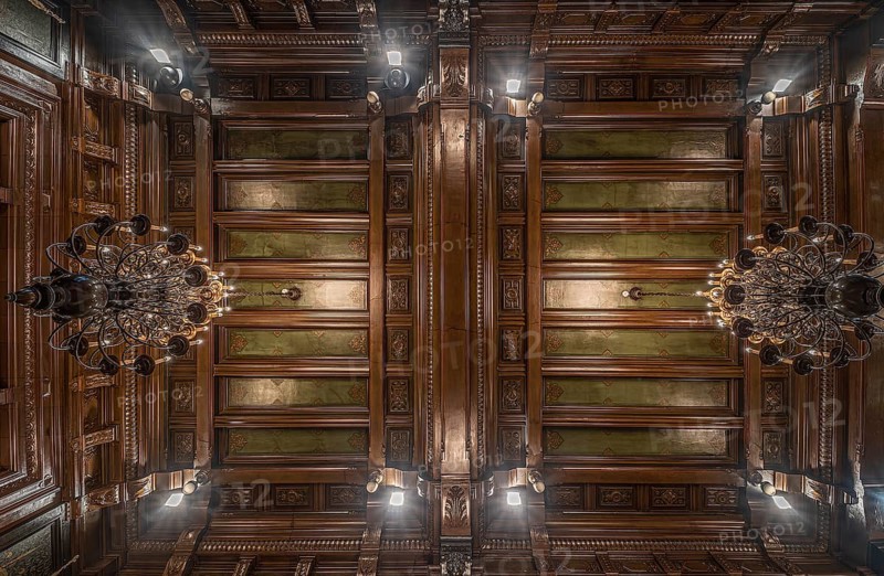 Anderlecht, Brussels Capital Region, Belgium- 02 28 2020 Decorated ceiling with wood and vintage chandeliers