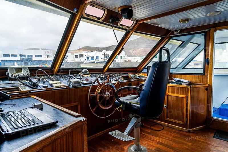 The ferry cockpit will all necessary instruments to travel at boat approaching La Graciosa island, one of Canary Islands, Spain, Europe