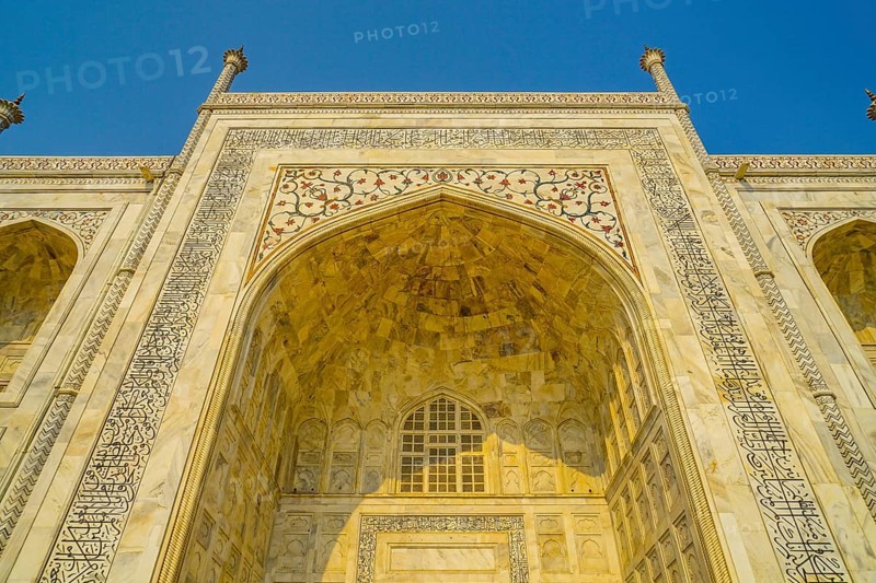 The Taj Mahal, which is wrapped in a sunset (India, Agra). Shooting Location: India