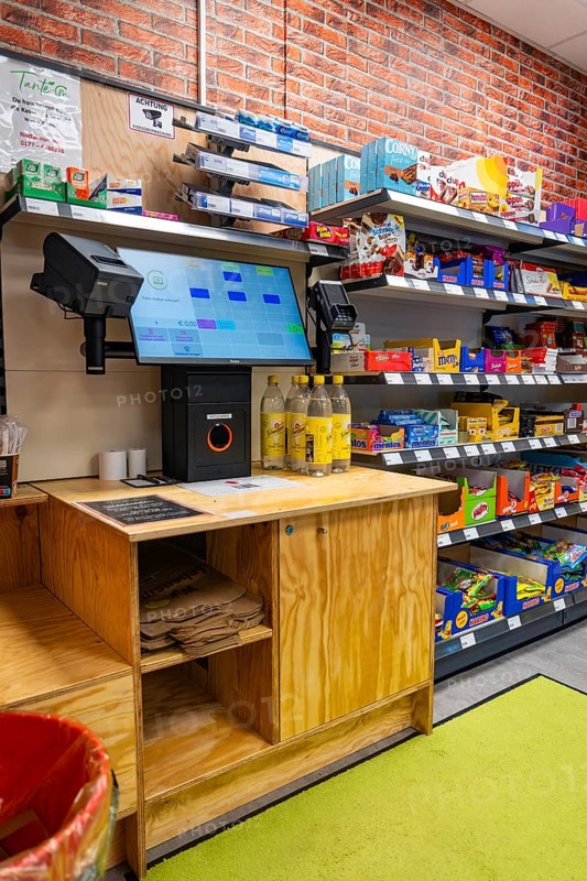 Digital checkout and shelves full of products in a modern supermarket, Tante M, self-service shop, Enzklösterle, Calw district, Black Forest, Germany, Europe