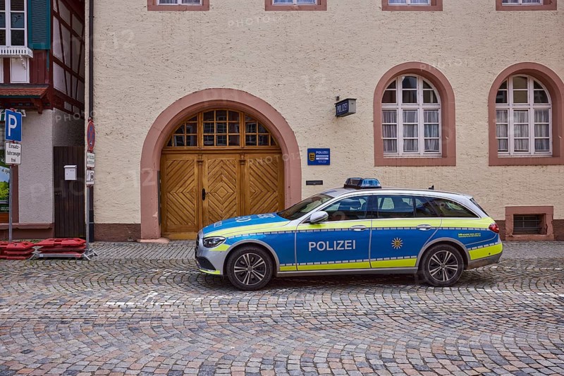 Police car, Wolfach police station, car park for emergency vehicles, entrance, historic building, old town, main street, Wolfach, Black Forest, Ortenaukreis, Baden-Württemberg, Germany, Europe