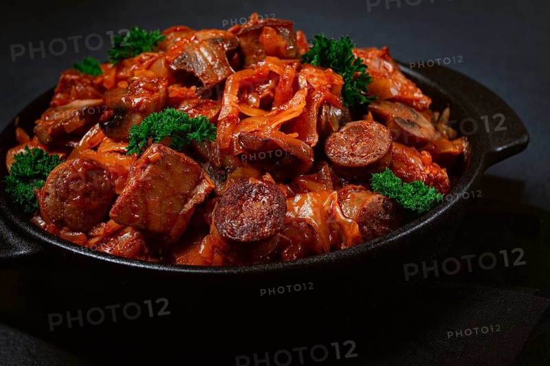 Bigos, bigus is a national Polish dish, made of cabbage and meat, stewed, homemade, no people