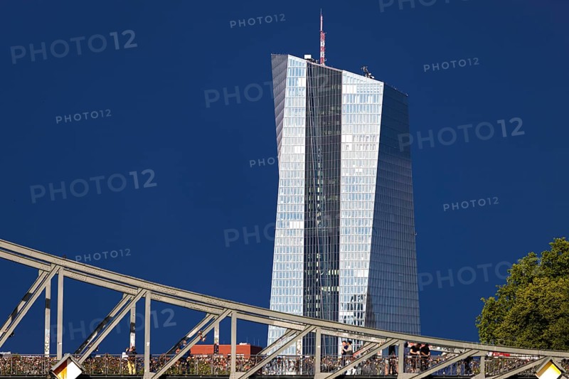After a storm, the glass façade of the European Central Bank (ECB) shines in the sunlight, Frankfurt am Main, Hesse, Germany, Europe