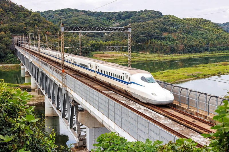 Shinkansen type N700 high-speed train of Japan Rail JR train on the Sanyo Shinkansen line in Kurashiki, Japan, Asia