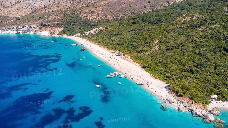Aerial drone view of the paradise beach of Kroreza or Krorez on the Albanian riviera in Sarande, Albania. turquoise waters