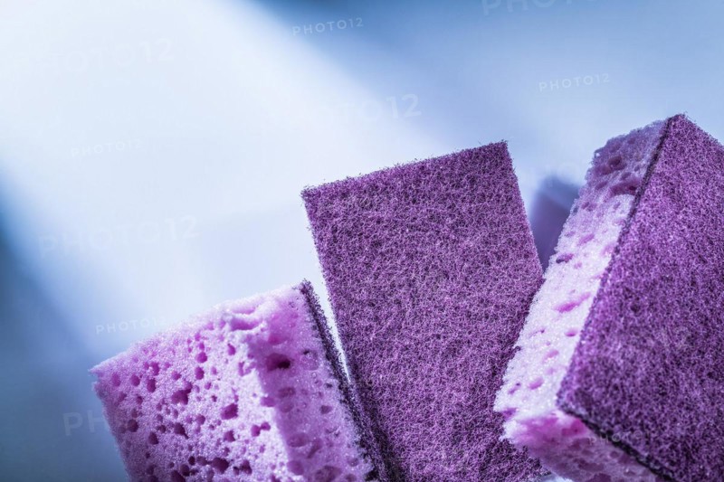 New dishwashing sponges on white background