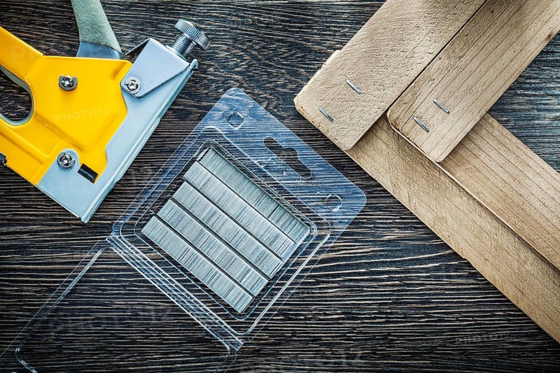 Building stapler gun staples wooden planks