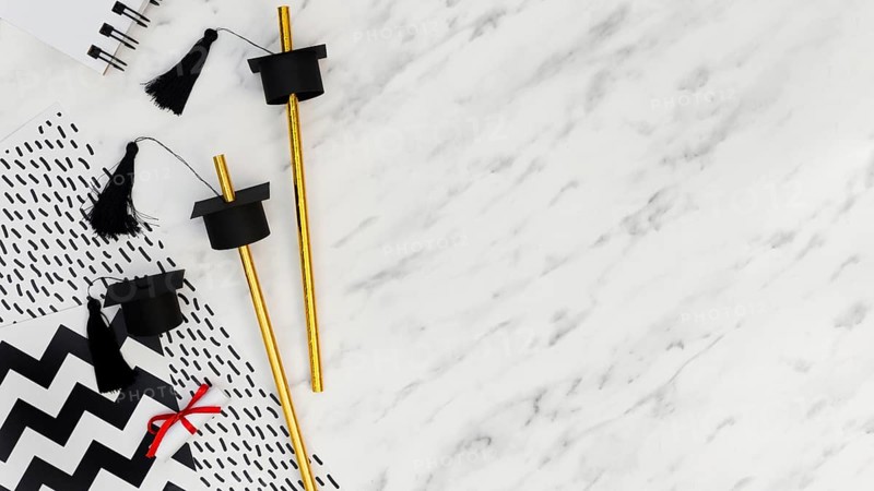 Flat lay festive graduation arrangement marble background