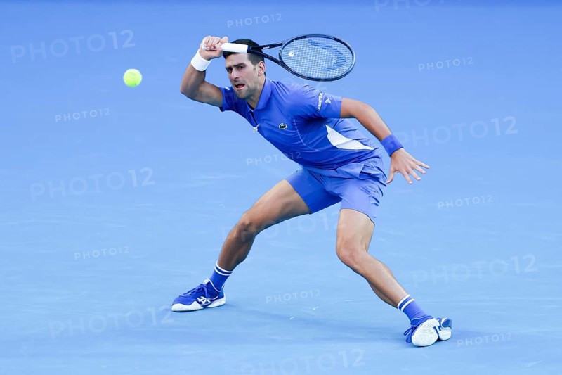 MELBOURNE, AUSTRALIA, JANUARY 11: Novak Djokovic of Serbia plays Stefanos Tsitsipas of Greece during a charity match ahead of the 2024 Australian Open at Melbourne Park on January 11, 2024 in Melbourne, Australia, Oceania