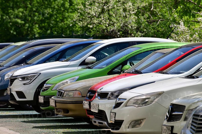 Moscow, Russia, 17 May. 2021. Row of cars parked along road, Europe