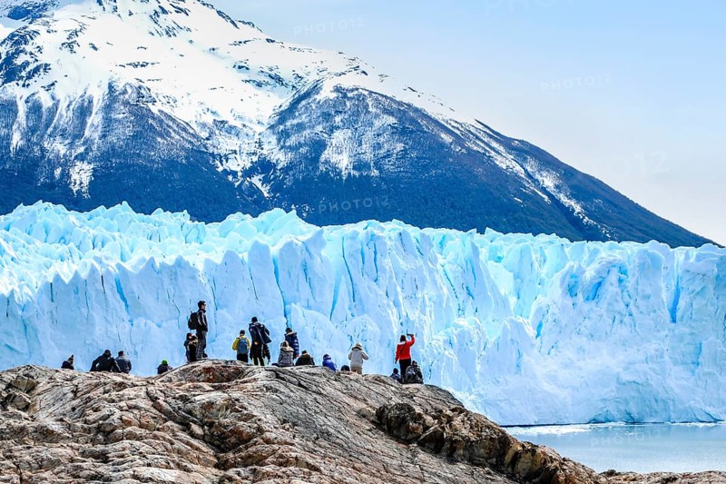Tourists exploring the stunning Perito Moreno Glacier