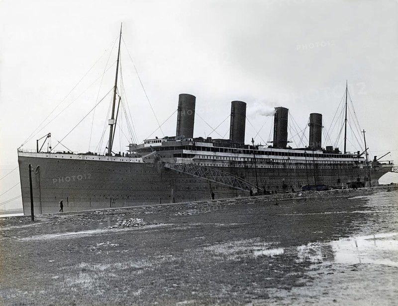The Titanic. A British passenger liner operated by the White Star Line which sank in the North Atlantic Ocean on 15 April 1912 after striking an iceberg during her maiden voyage from Southampton to New York City. The Titanic was launched on 31 May 1911 and was towed to a fitting-out berth where over the course of the following year, engines, and interior was fitted out. The picture taken at Harland and Wolff in Belfast, Ireland in march 1912 during this time prior Titanic's sea trials and maiden voyage