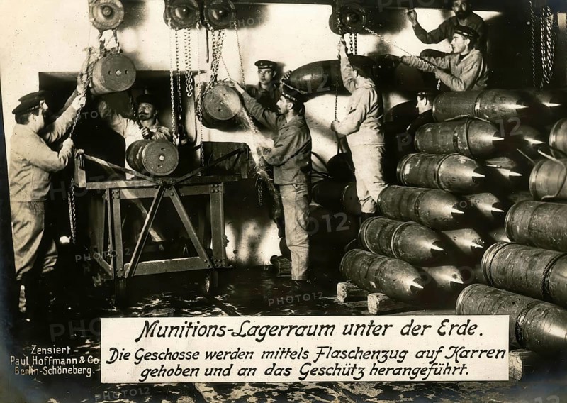 Underground ammunition storage room. The shells are lifted onto carts using a pulley and brought to the gun, 1914 - 1918, World War I, reproduction of a wartime postcard