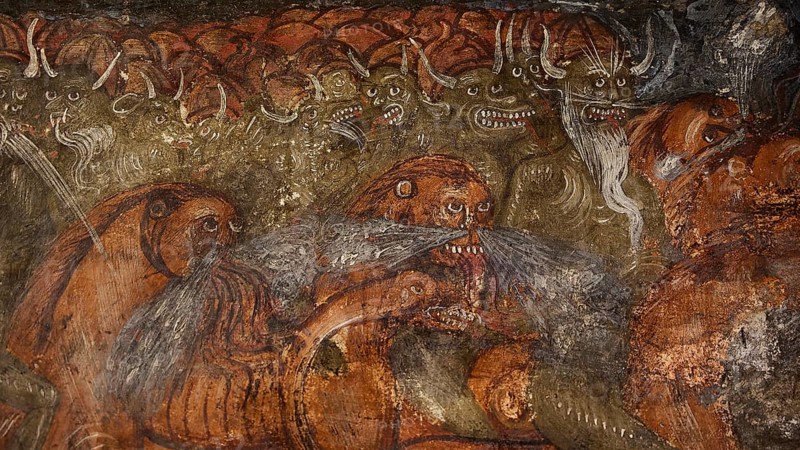 A mural shows grotesque, demonic creatures with grim faces in a menacing scene, Easter 2025, Church of the Dormition of the All-Holy God Bear, Kimisis tis Theotokou, Asklipio, Rhodes, Dodecanese, Greek Islands, Greece, Europe