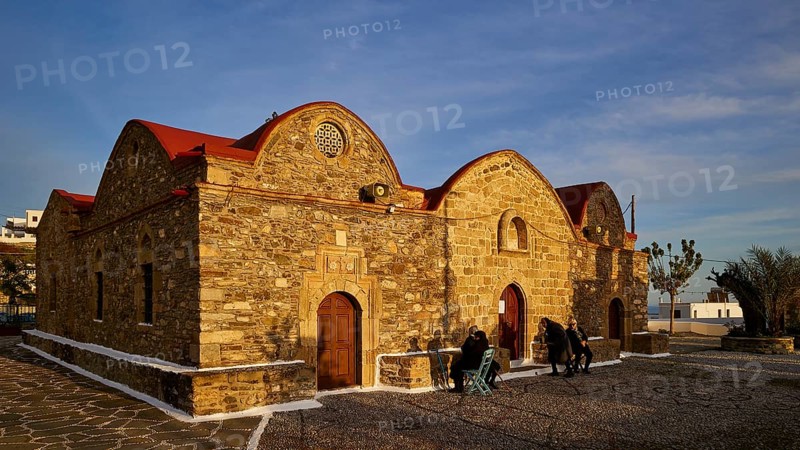 Stone church with vaulted roofs in the evening light and soft shadows, Easter 2025, Church of the Dormition of the All-Holy God Bear, Kimisis tis Theotokou, Asklipio, Rhodes, Dodecanese, Greek Islands, Greece, Europe