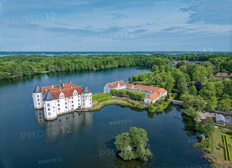 Glücksburg Castle and the castle pond. The lake is part of the Munkbrarupau stream. Aerial view. Glücksburg, Schleswig-Flensburg district, Schleswig-Holstein, Germany, Europe