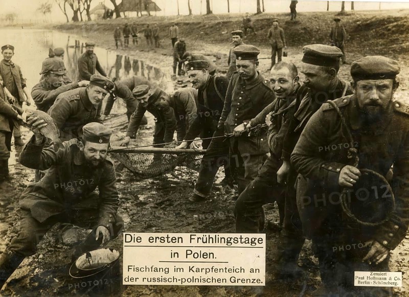 The first days of spring in Poland, fishing in a carp pond on the Russian-Polish border, 1914 - 1918, World War I, reproduction of a wartime postcard