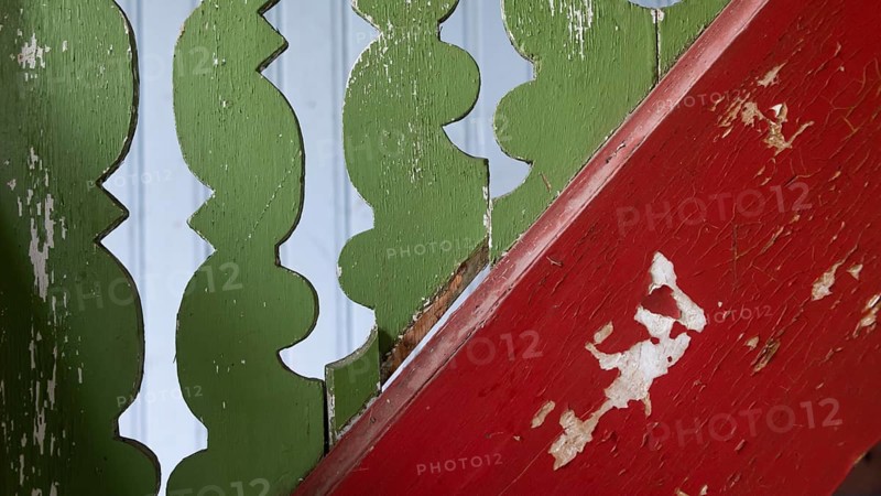 Old staircase detail painted red and green