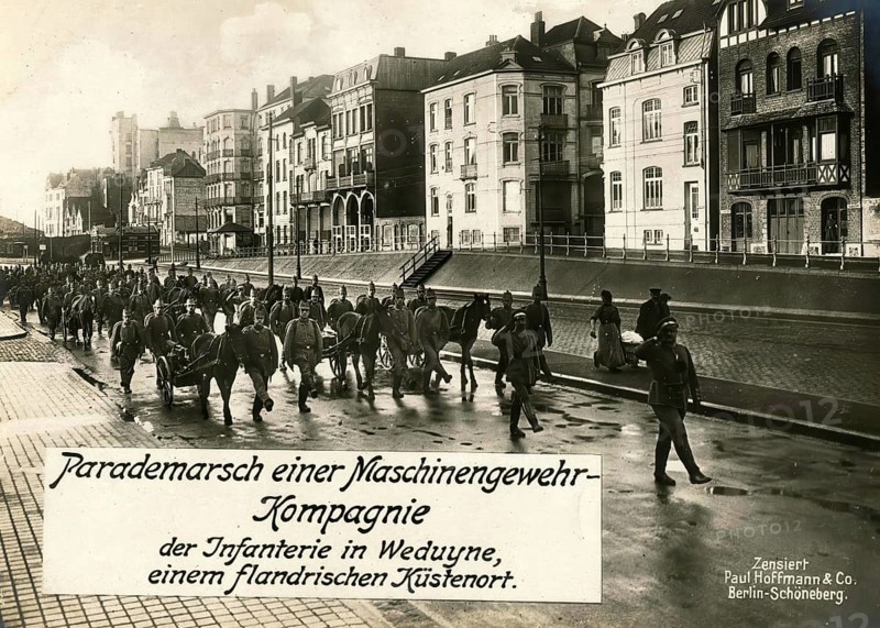 Parade march of an infantry machine gun company in Weduyne, a Flemish coastal town, 1914 - 1918, 1st World War, reproduction of a war postcard